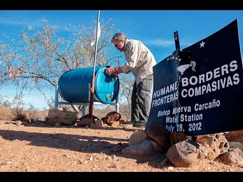 Humane Borders. Man providing water to immigrants in the Arizona dessert.